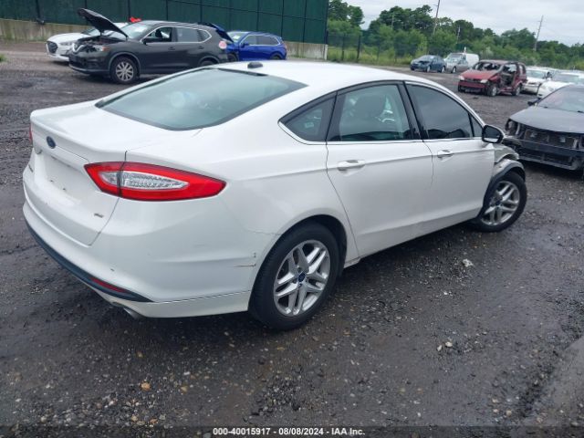 Photo 3 VIN: 3FA6P0H76GR235669 - FORD FUSION 