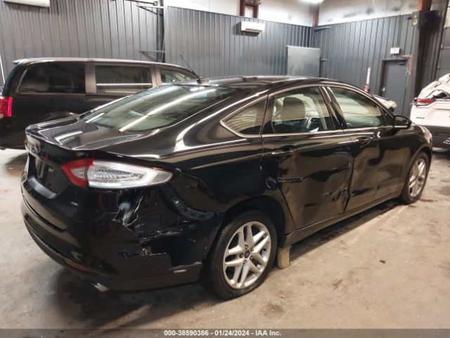 Photo 5 VIN: 3FA6P0H76GR348568 - FORD FUSION 