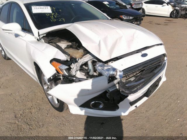 Photo 5 VIN: 3FA6P0H76GR384485 - FORD FUSION 