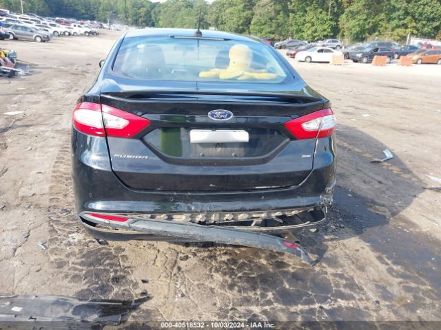 Photo 5 VIN: 3FA6P0H7XGR323351 - FORD FUSION 