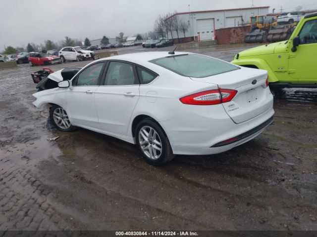 Photo 2 VIN: 3FA6P0H7XGR323611 - FORD FUSION 