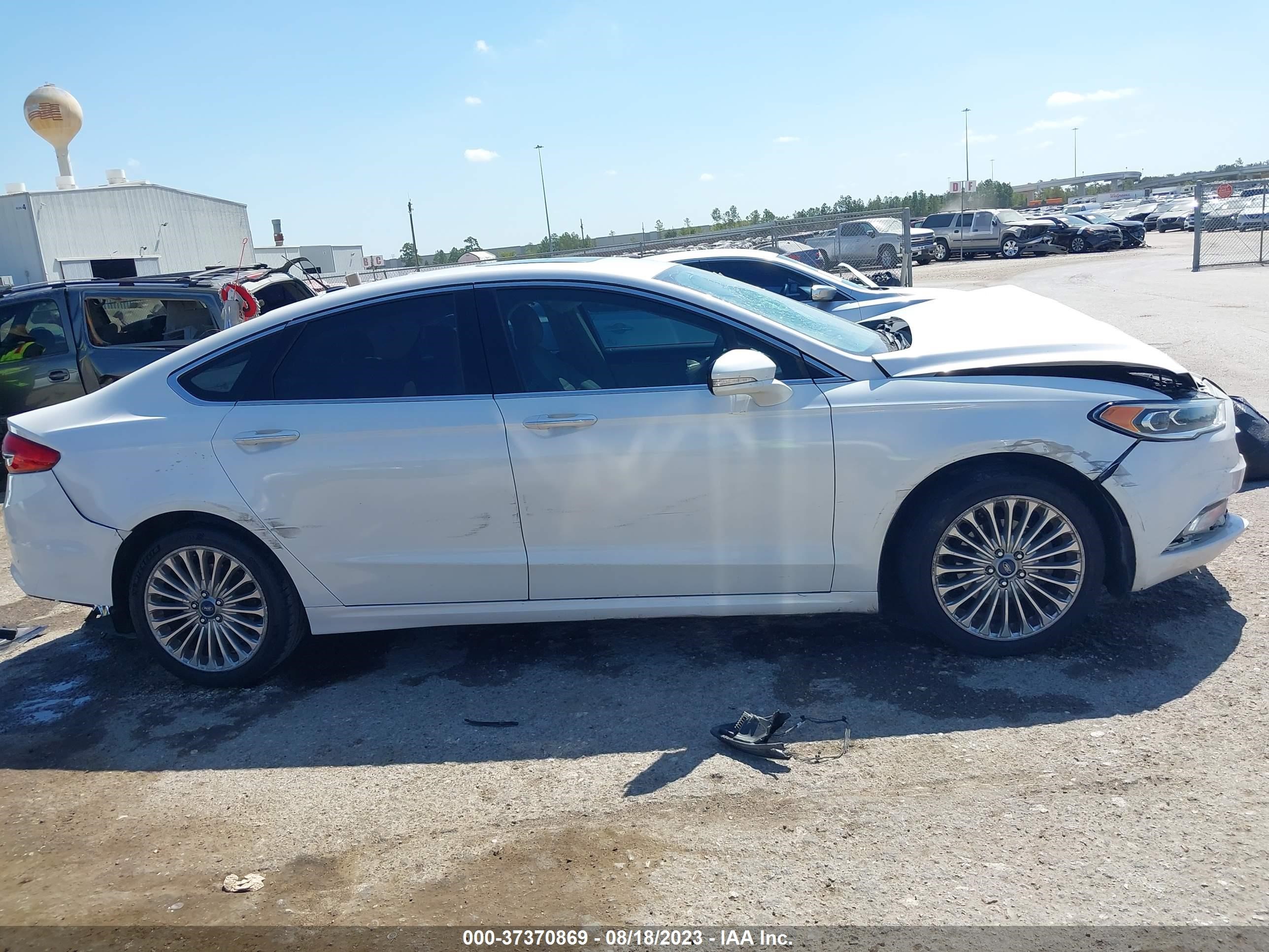 Photo 13 VIN: 3FA6P0H91HR214411 - FORD FUSION 