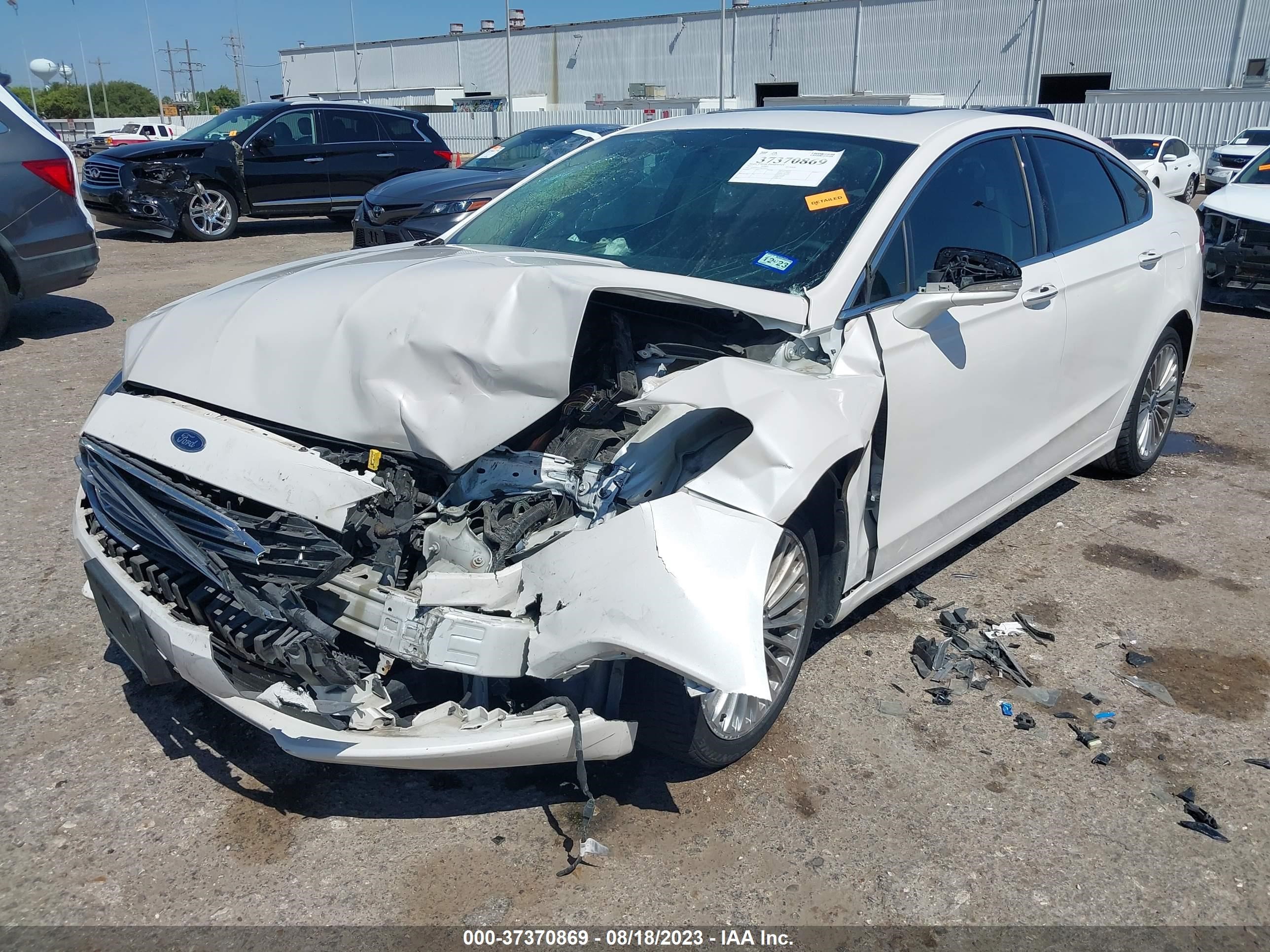 Photo 5 VIN: 3FA6P0H91HR214411 - FORD FUSION 