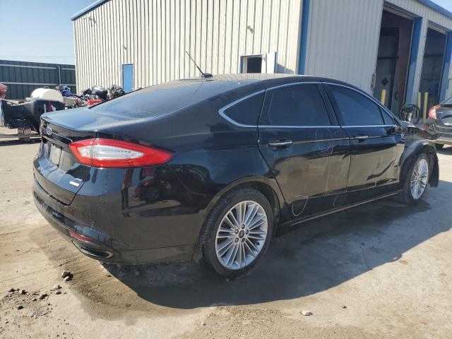 Photo 2 VIN: 3FA6P0H92GR289309 - FORD FUSION SE 