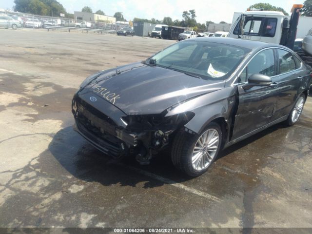 Photo 5 VIN: 3FA6P0H97GR394976 - FORD FUSION 