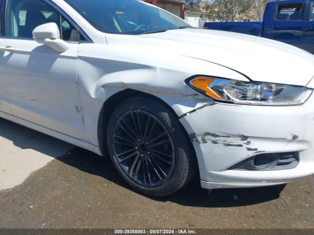 Photo 5 VIN: 3FA6P0H98GR144680 - FORD FUSION 