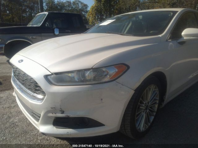 Photo 5 VIN: 3FA6P0H99ER360759 - FORD FUSION 