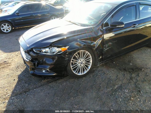 Photo 5 VIN: 3FA6P0H99GR265623 - FORD FUSION 