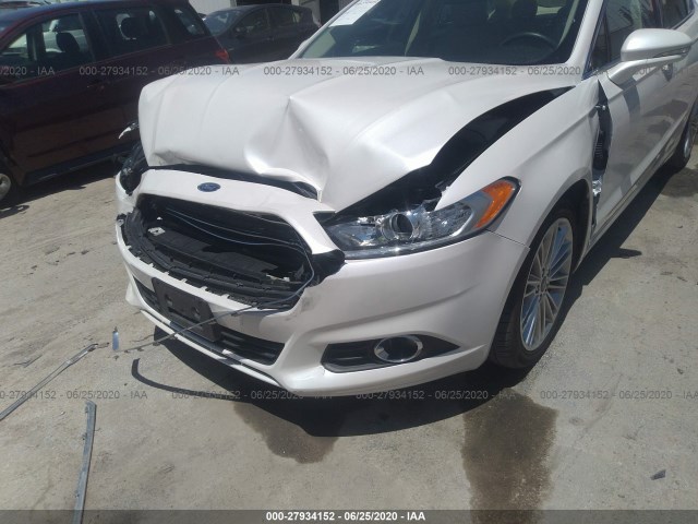 Photo 5 VIN: 3FA6P0HD1GR303303 - FORD FUSION 