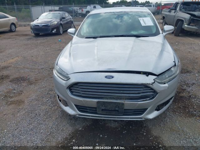 Photo 5 VIN: 3FA6P0HD4GR391277 - FORD FUSION 