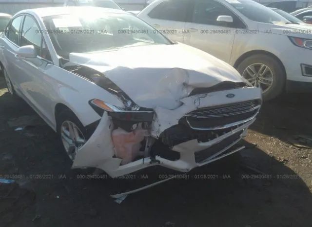 Photo 5 VIN: 3FA6P0HD5GR337650 - FORD FUSION 