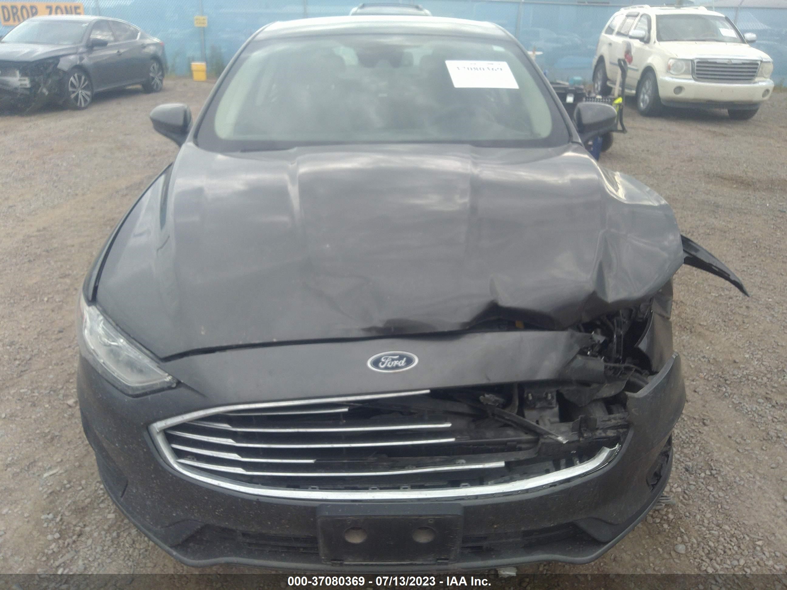 Photo 11 VIN: 3FA6P0HD6KR202301 - FORD FUSION 