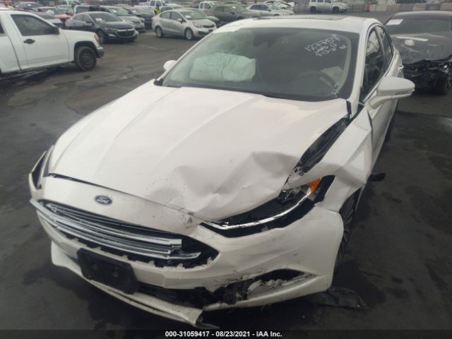 Photo 5 VIN: 3FA6P0HD9JR285348 - FORD FUSION 