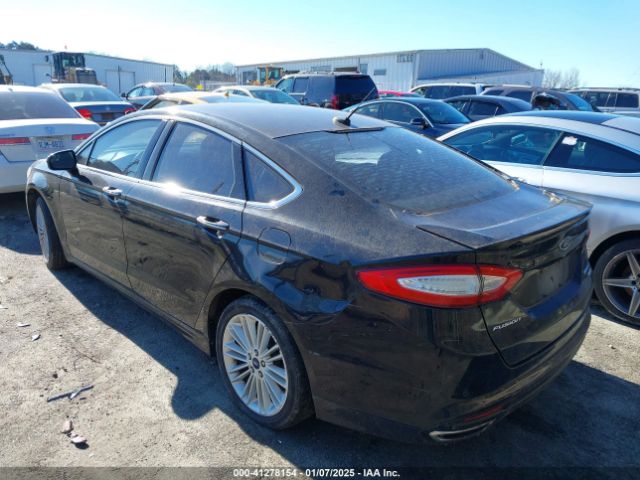 Photo 2 VIN: 3FA6P0K90GR344378 - FORD FUSION 