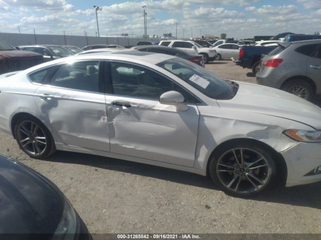 Photo 5 VIN: 3FA6P0K96GR232457 - FORD FUSION 