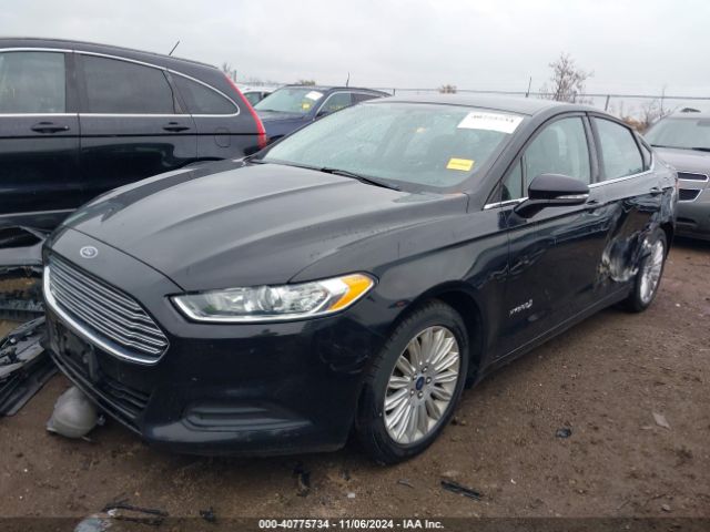 Photo 1 VIN: 3FA6P0LU0GR359482 - FORD FUSION 