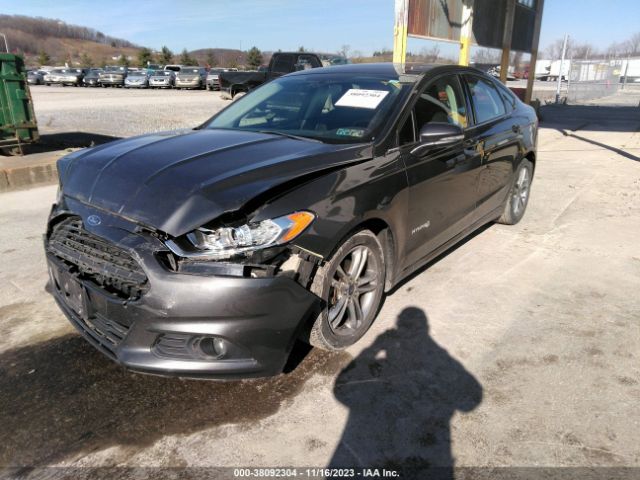 Photo 1 VIN: 3FA6P0LU1GR339287 - FORD FUSION HYBRID 