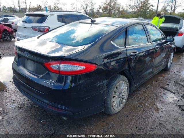 Photo 3 VIN: 3FA6P0LU1GR403702 - FORD FUSION 