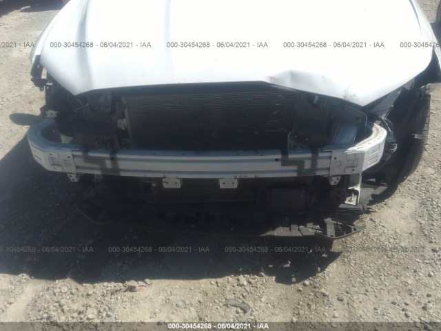 Photo 5 VIN: 3FA6P0LU1KR181090 - FORD FUSION HYBRID 