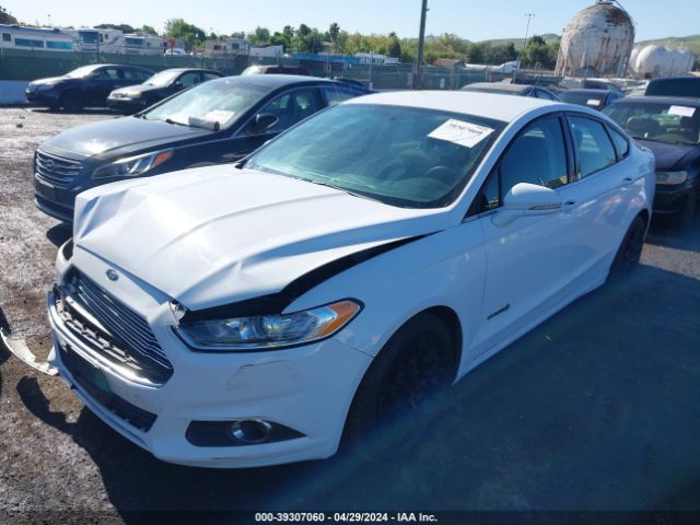 Photo 1 VIN: 3FA6P0LU6GR342816 - FORD FUSION 