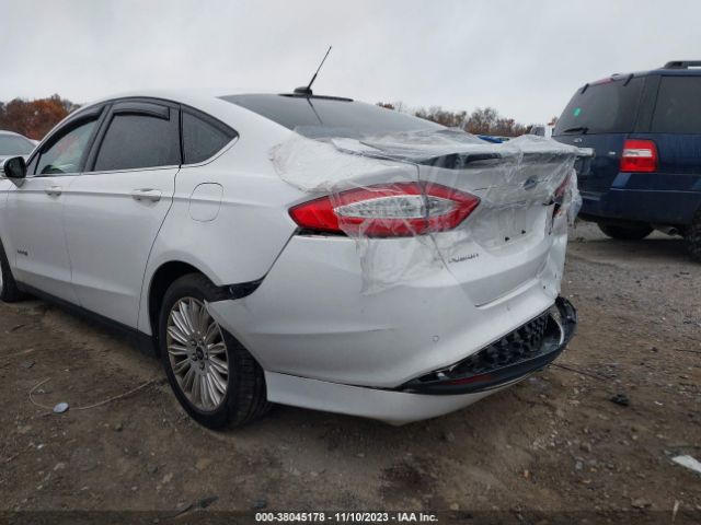 Photo 5 VIN: 3FA6P0LU6GR349006 - FORD FUSION HYBRID 