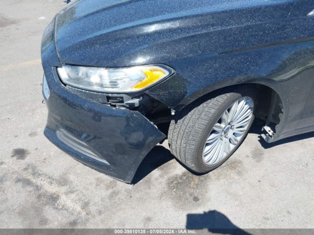 Photo 5 VIN: 3FA6P0LU9GR328392 - FORD FUSION 