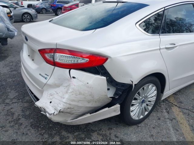 Photo 5 VIN: 3FA6P0LU9GR384638 - FORD FUSION HYBRID 