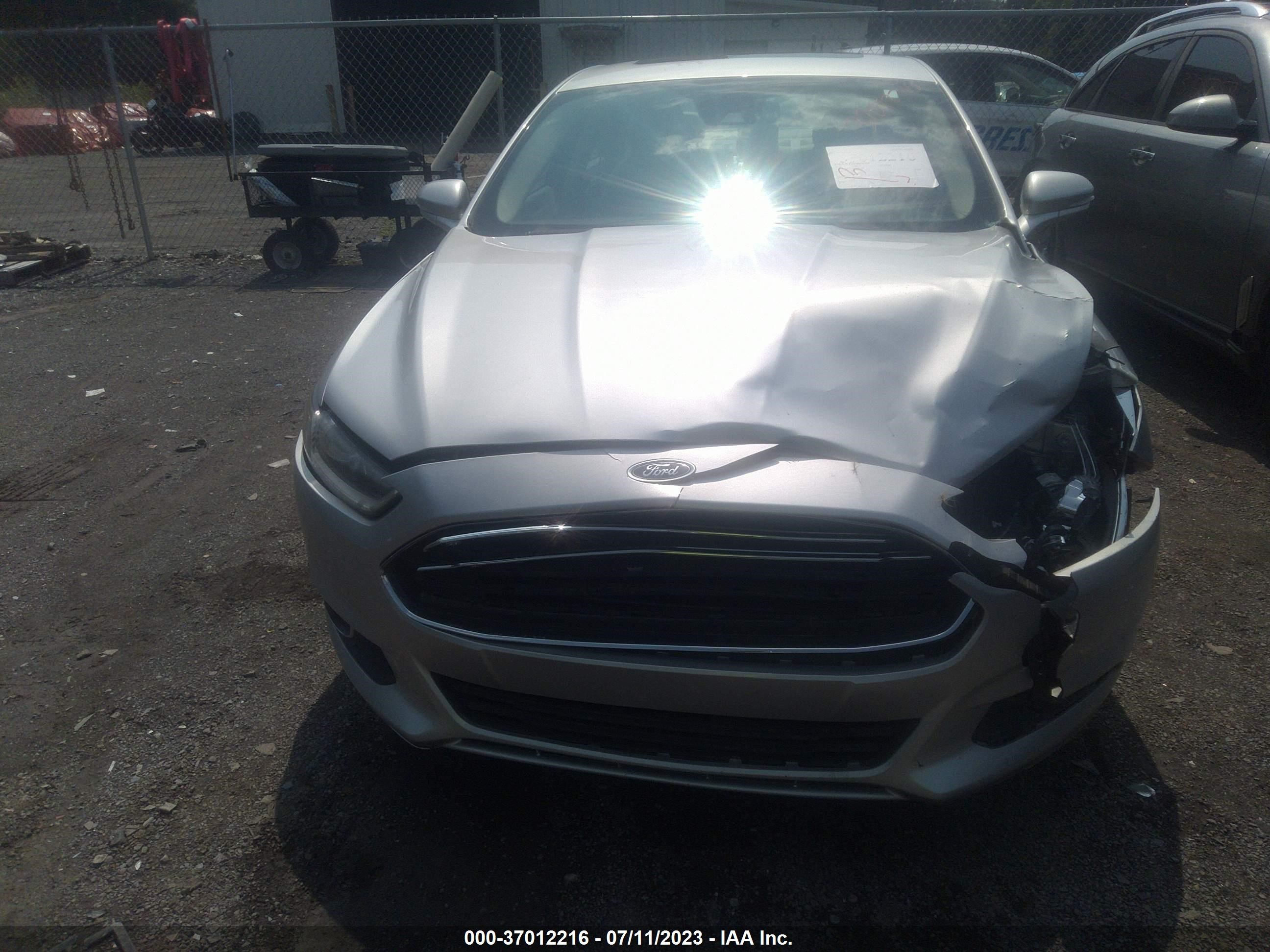 Photo 10 VIN: 3FA6P0LUXGR102460 - FORD FUSION 