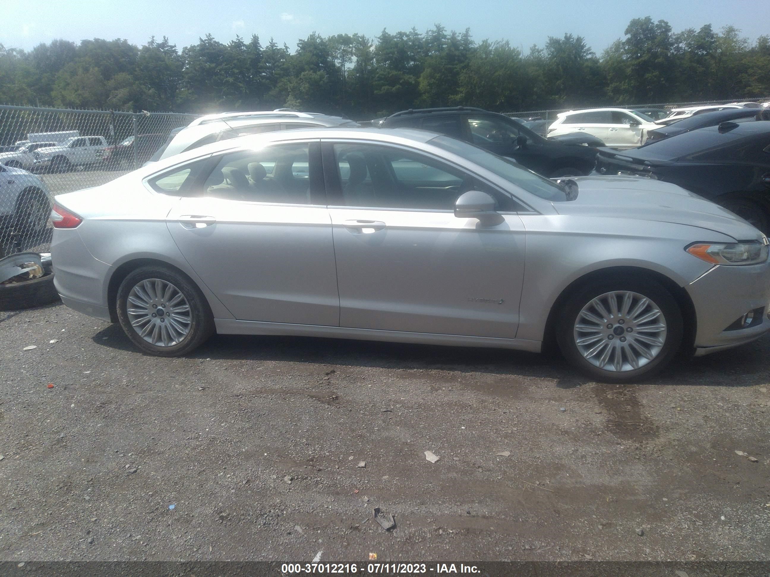 Photo 11 VIN: 3FA6P0LUXGR102460 - FORD FUSION 