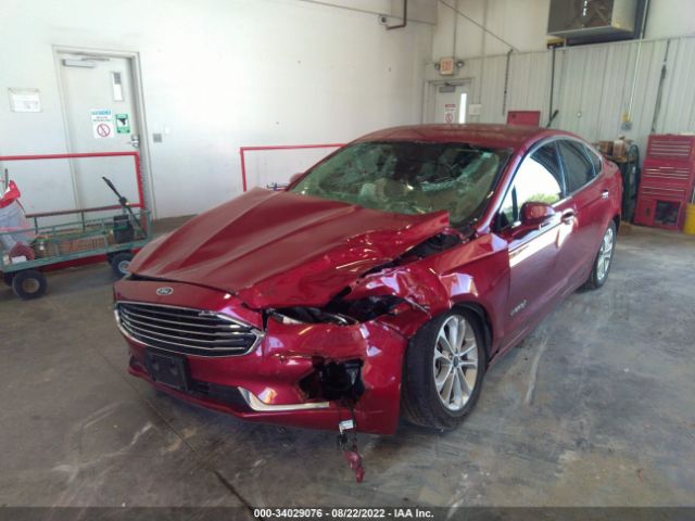 Photo 5 VIN: 3FA6P0MU0KR123602 - FORD FUSION HYBRID 