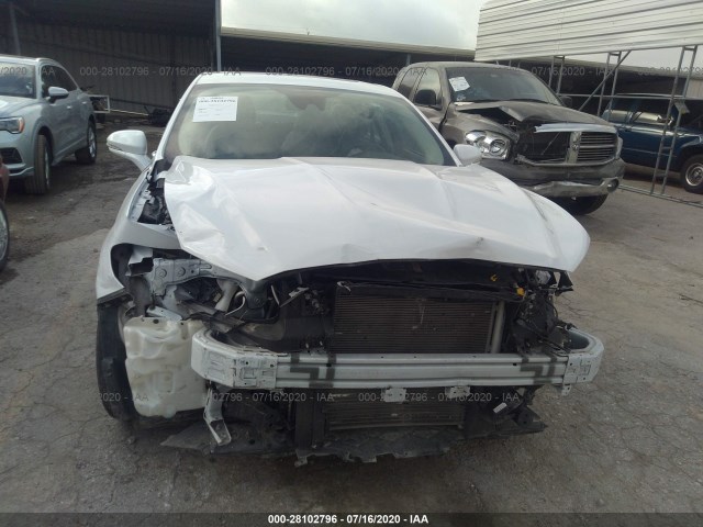 Photo 5 VIN: 3FA6P0MU4KR180983 - FORD FUSION HYBRID 