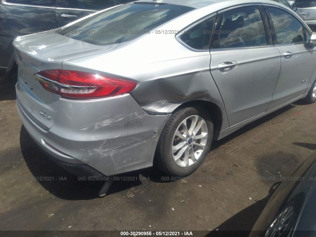 Photo 5 VIN: 3FA6P0MU9KR109391 - FORD FUSION HYBRID 