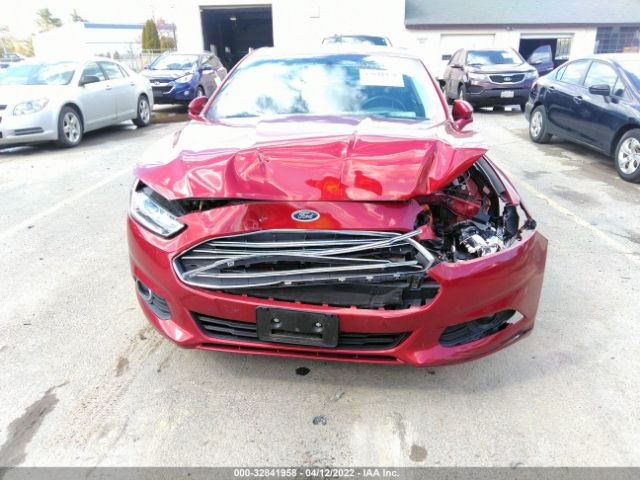 Photo 5 VIN: 3FA6P0PU1GR401751 - FORD FUSION ENERGI 