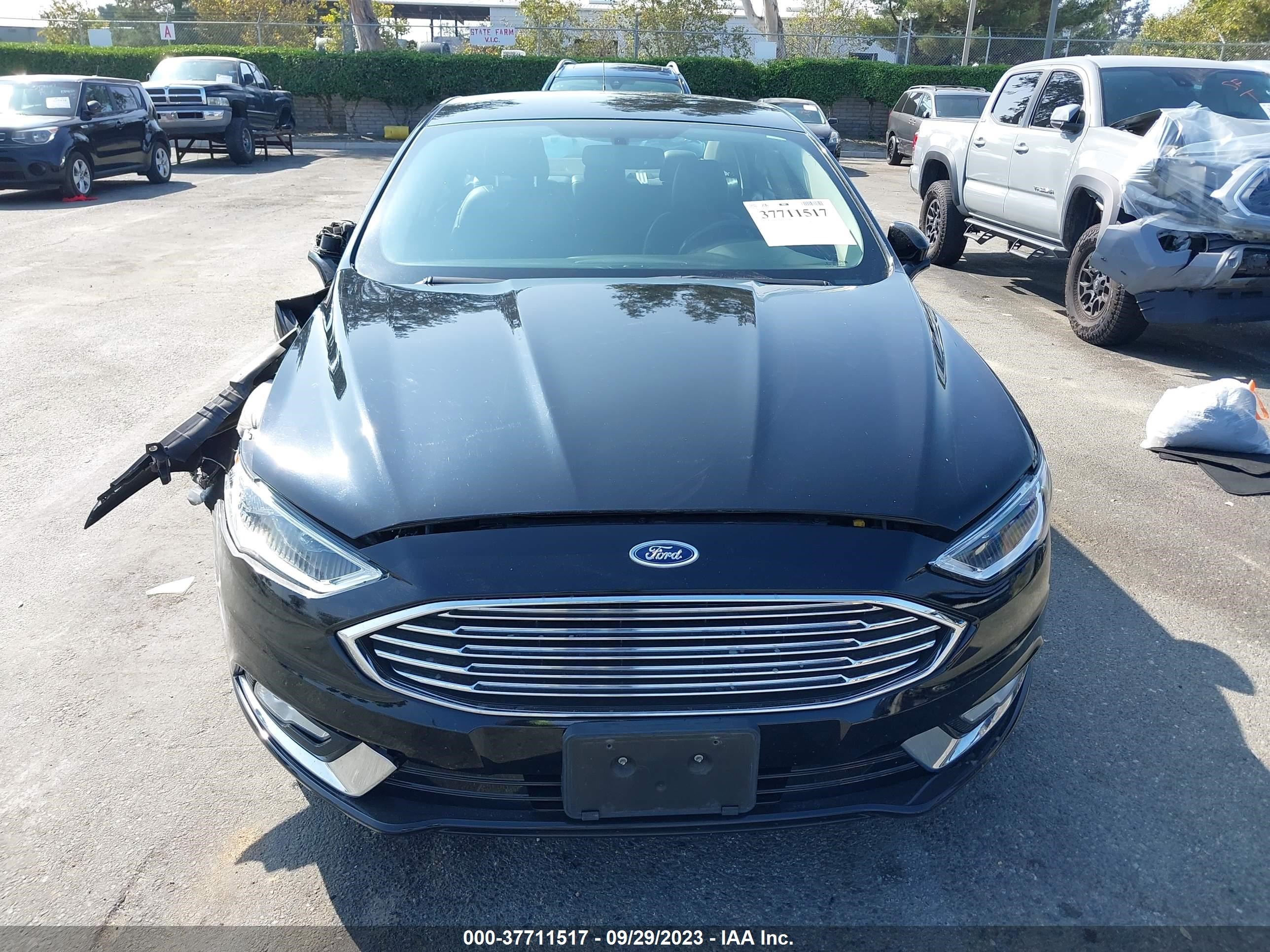 Photo 11 VIN: 3FA6P0PU4HR329705 - FORD FUSION 