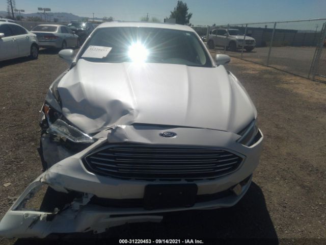 Photo 5 VIN: 3FA6P0RU5JR143271 - FORD FUSION HYBRID 