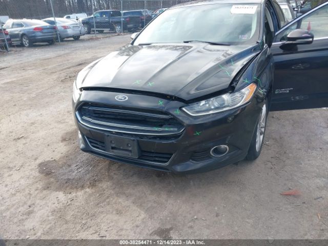 Photo 5 VIN: 3FA6P0SU1GR401739 - FORD FUSION ENERGI 