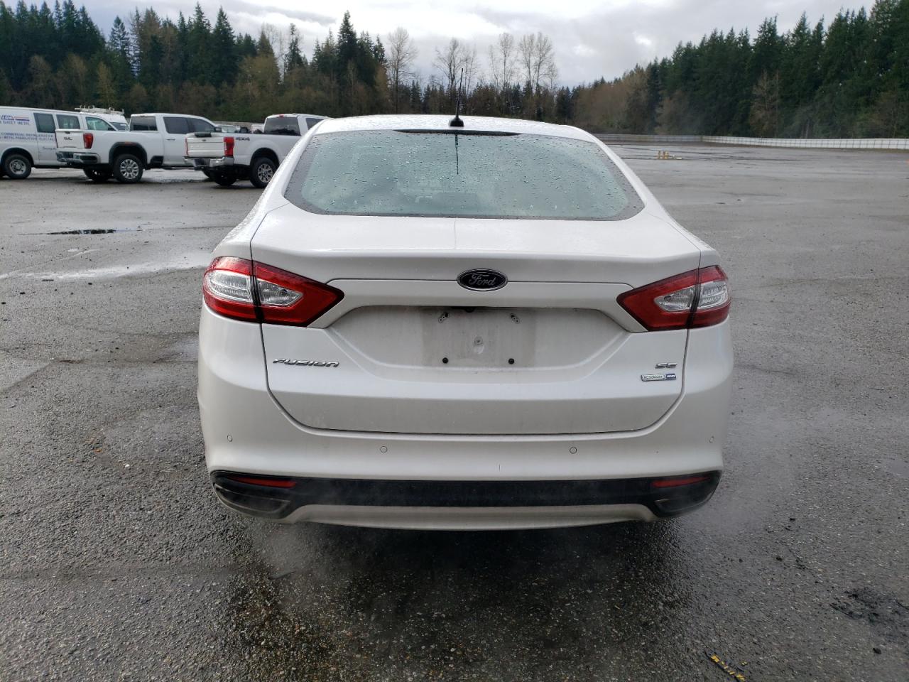 Photo 5 VIN: 3FA6P0T90GR329832 - FORD FUSION 