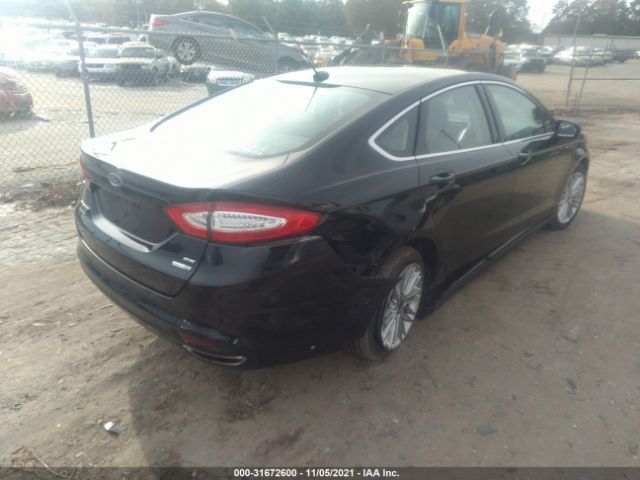 Photo 3 VIN: 3FA6P0T91GR291866 - FORD FUSION 