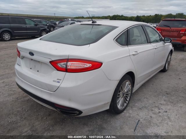 Photo 3 VIN: 3FA6P0T93GR141600 - FORD FUSION 