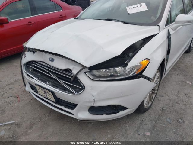 Photo 5 VIN: 3FA6P0T93GR141600 - FORD FUSION 