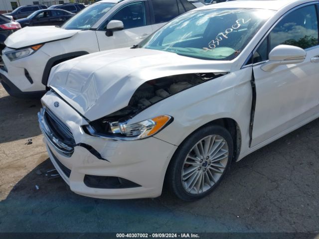 Photo 5 VIN: 3FA6P0T9XGR293292 - FORD FUSION 