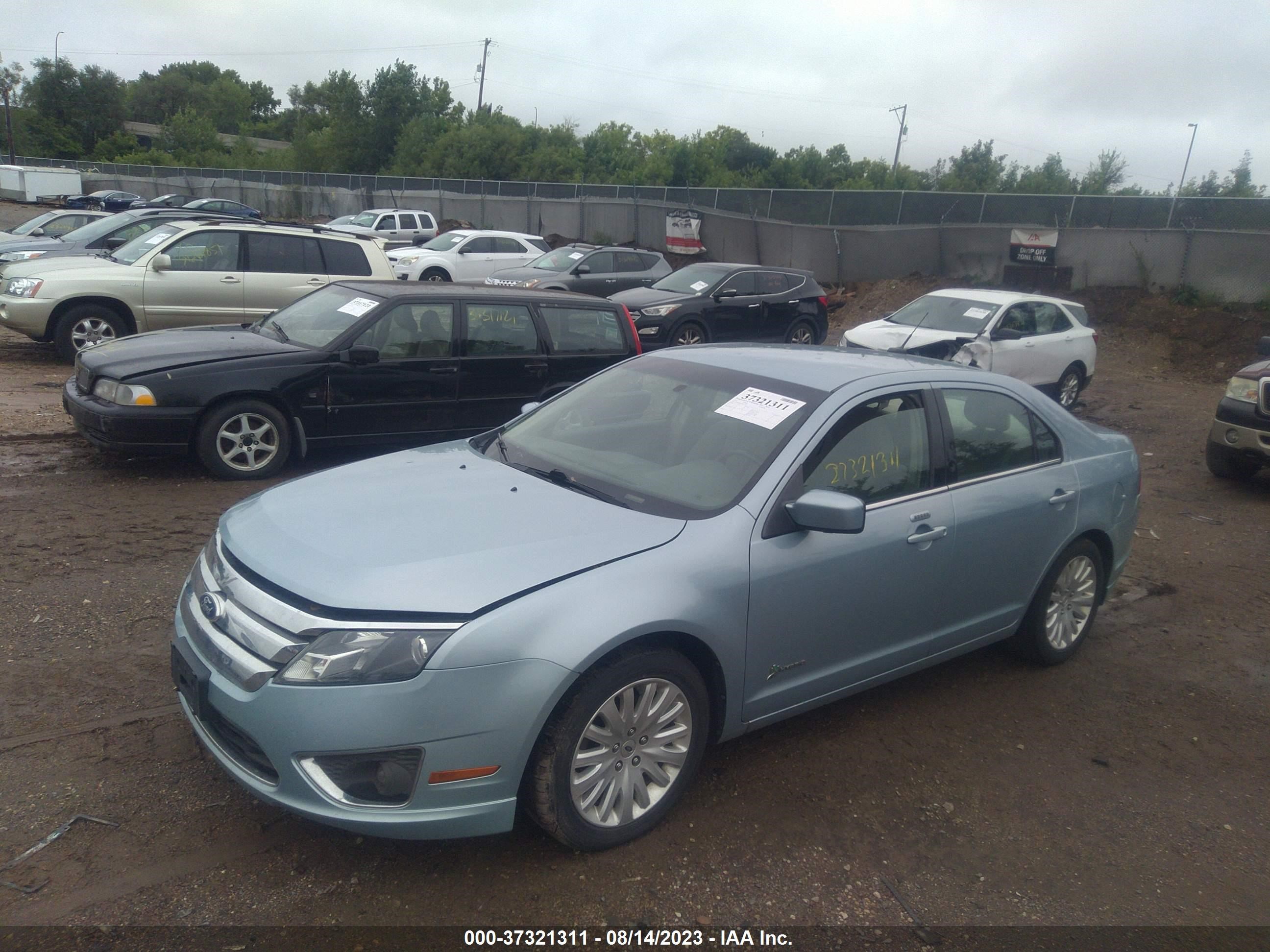 Photo 5 VIN: 3FADP0L31BR135502 - FORD FUSION 