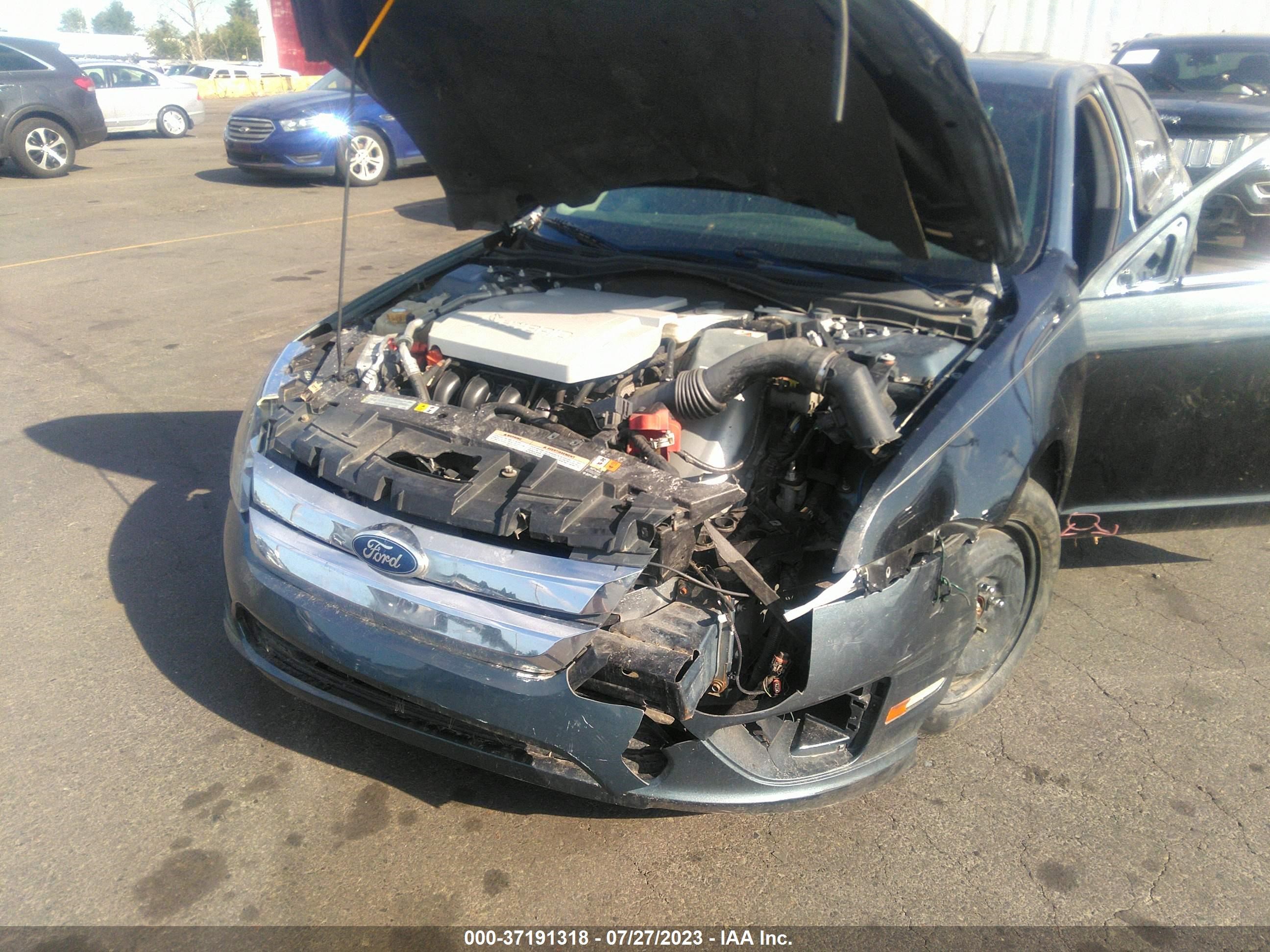 Photo 5 VIN: 3FADP0L31CR206246 - FORD FUSION 