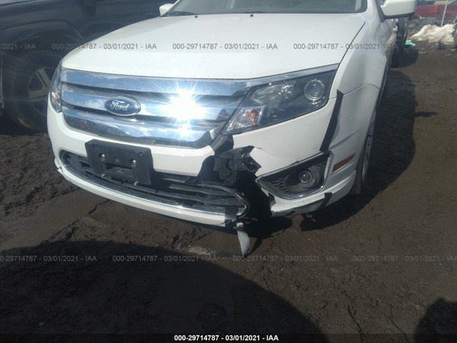 Photo 5 VIN: 3FADP0L31CR327469 - FORD FUSION 