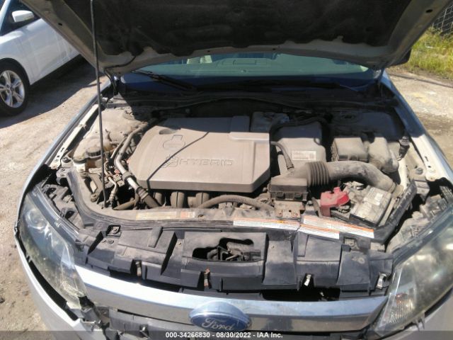 Photo 9 VIN: 3FADP0L34AR166788 - FORD FUSION 