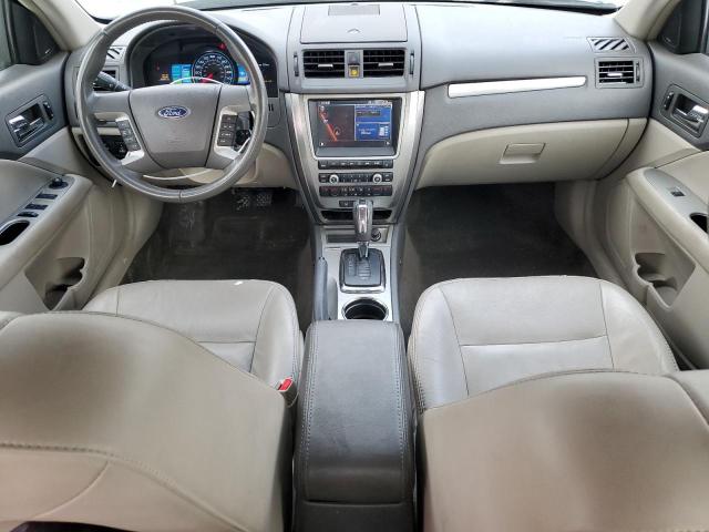 Photo 7 VIN: 3FADP0L34BR152388 - FORD FUSION 