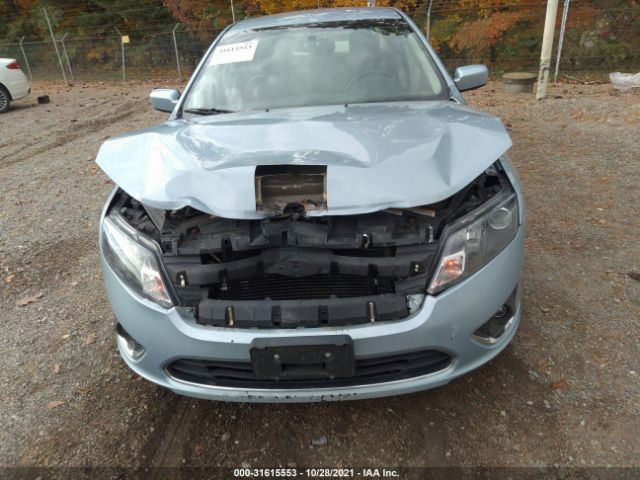 Photo 5 VIN: 3FADP0L34BR204070 - FORD FUSION 