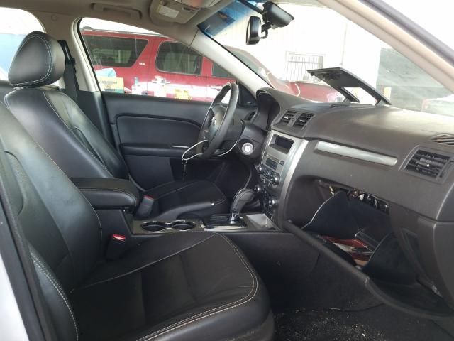 Photo 4 VIN: 3FADP0L34BR272000 - FORD FUSION HYB 