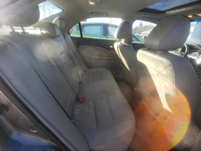 Photo 9 VIN: 3FADP0L34BR283319 - FORD FUSION 