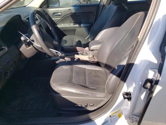 Photo 6 VIN: 3FADP0L34BR301687 - FORD FUSION 